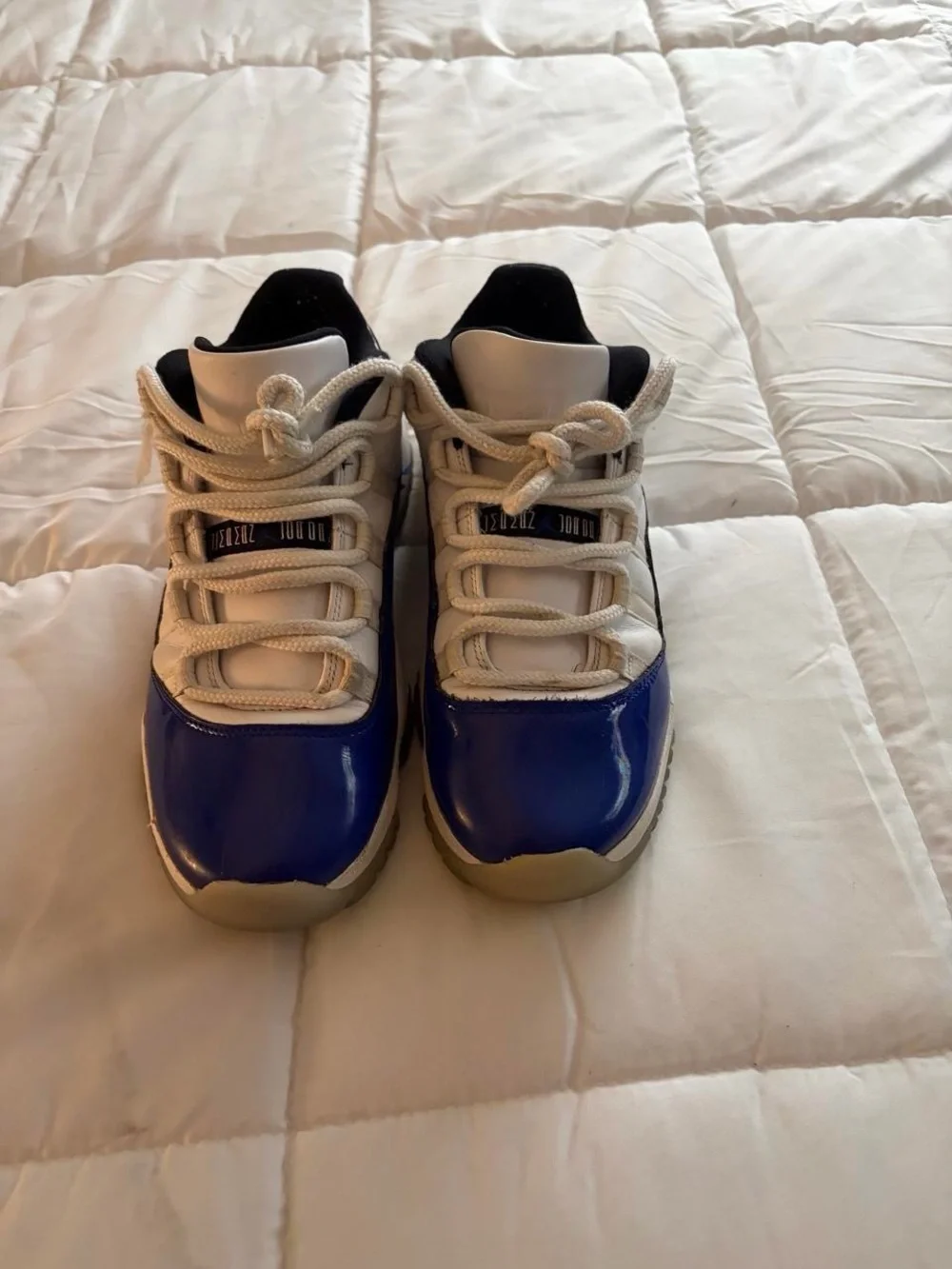 Jordan Men's Retro Low Top Sneakers in Blue, White, and Black